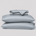 Juego de sábanas Calm Bambú 230 color gris claro doblado con sus fundas