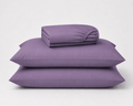 Semijuego de sábanas Calm Microfiber color púrpura doblado con sus fundas